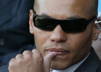 Karim Wade dément avoir été arrêté au Maroc en possession de drogue et menace de porter plainte!