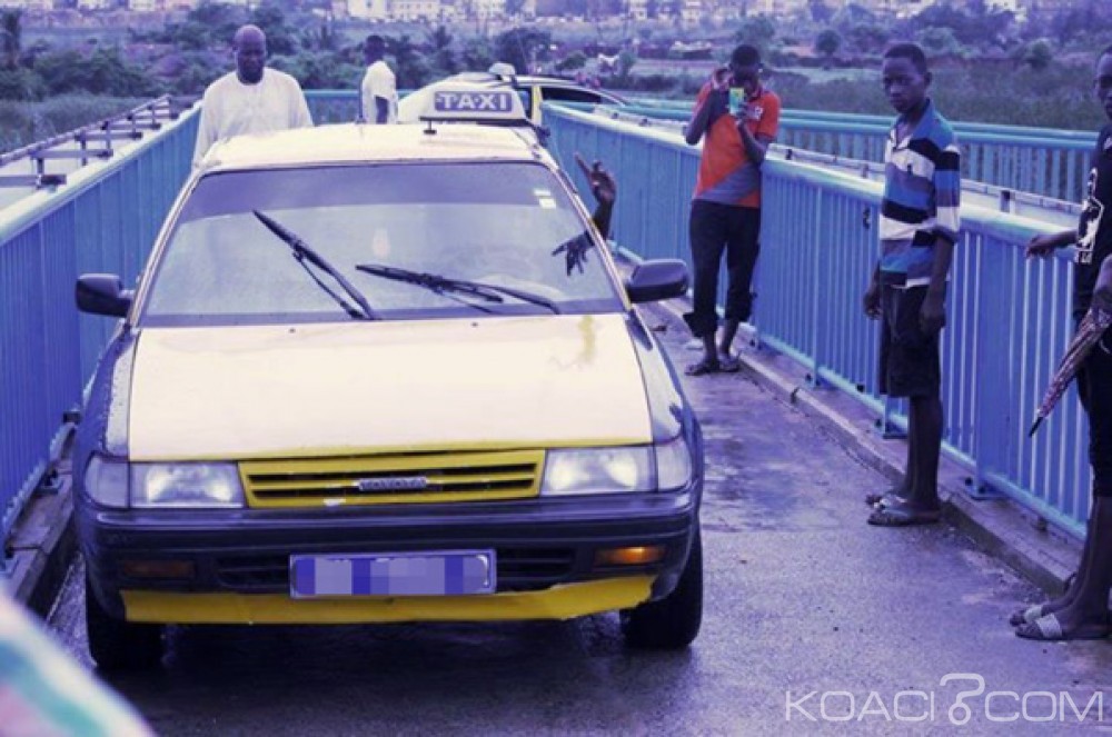 Sénégal : Le Buzz du Taxis empruntant la passerelle de l'autoroute après une forte pluie à  Dakar, le chauffeur arrêté